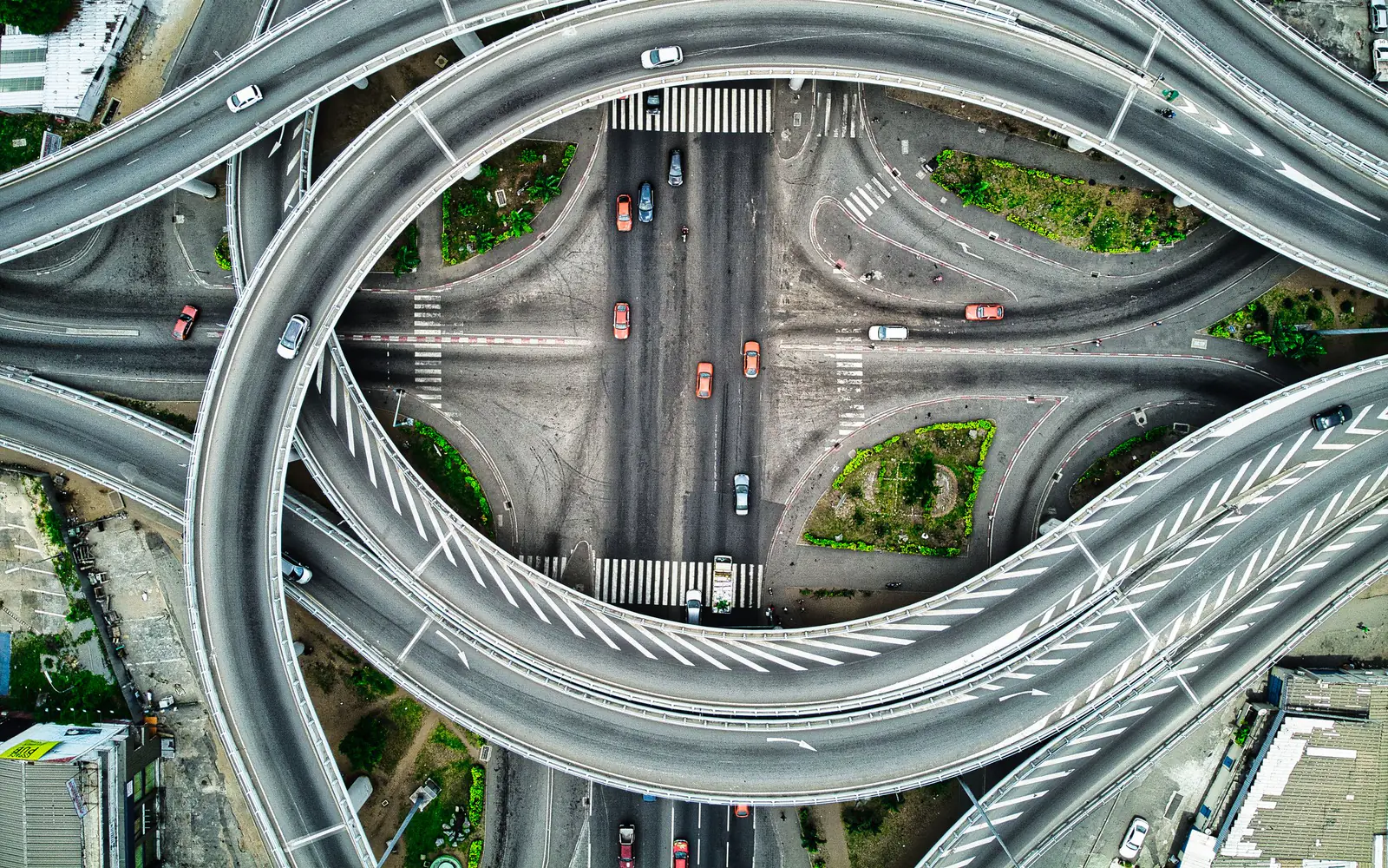 An aerial view of a multi-level highway interchange