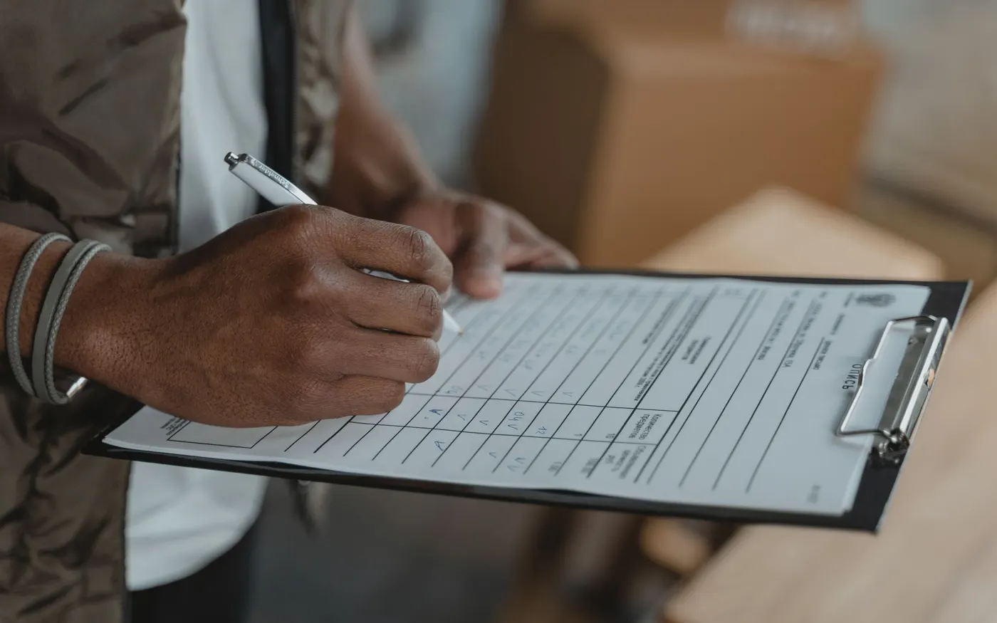 A form being completed on a clipboard
