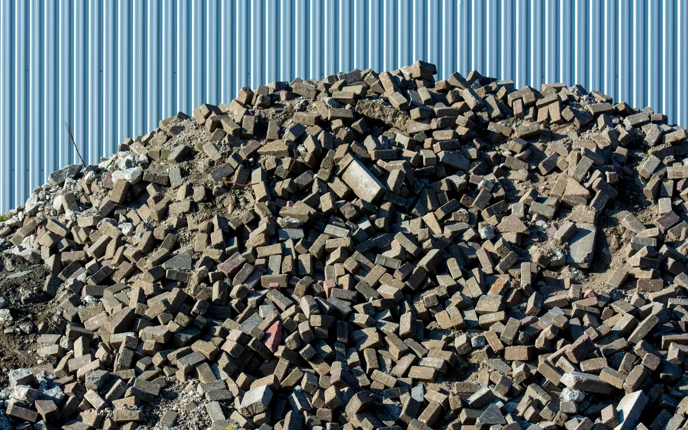 A pile of broken brick and rubble on a site