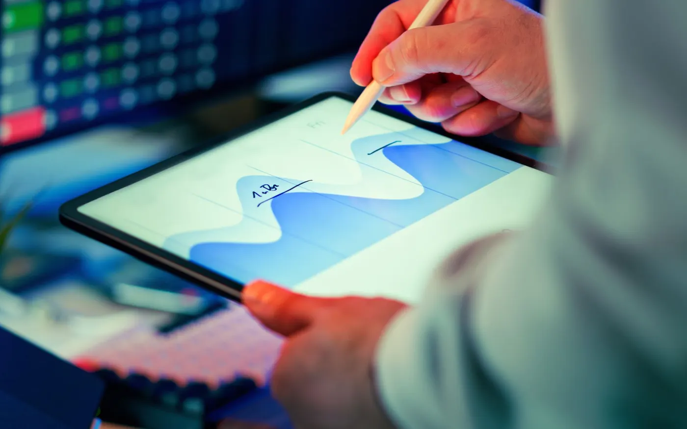 A data chart being worked through on a tablet